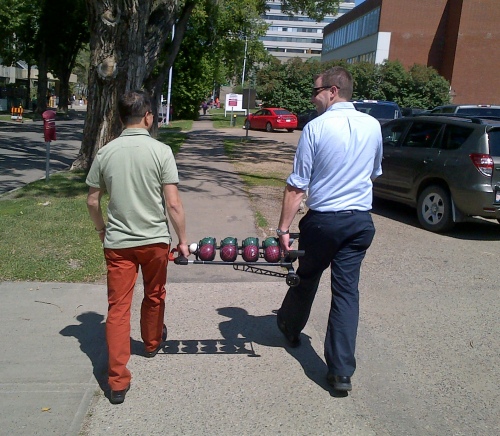 Carrying the bocce balls so the wheels don't fall off.